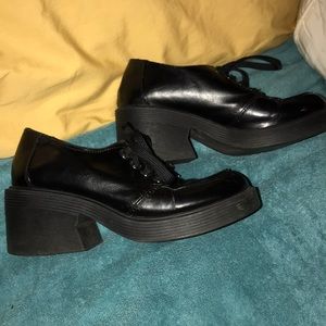 Size 7 Candies black platform tie-up shoes.